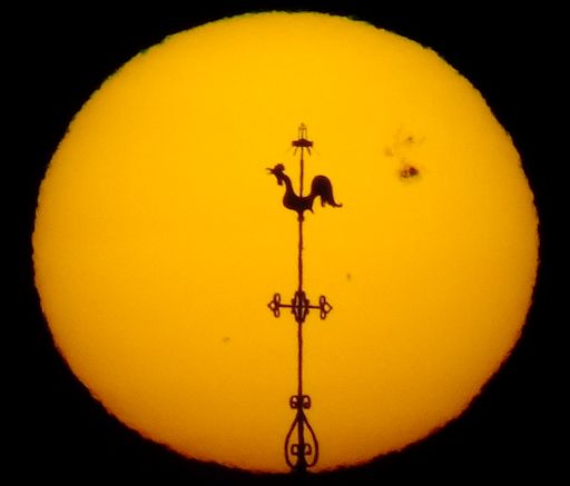 http://spaceweather.com/images2014/26oct14/sunspotsunrise_strip.jpg