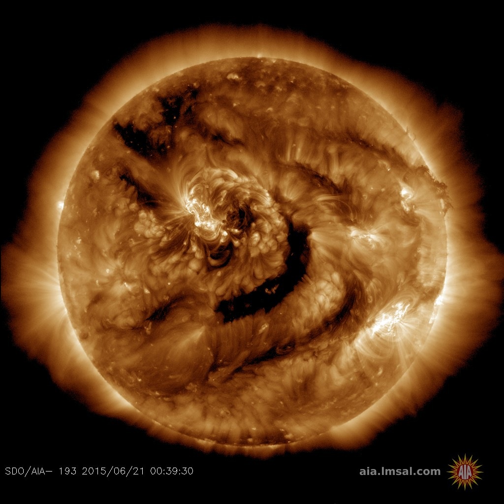 http://spaceweather.com/images2015/21jun15/coronalhole_sdo_blank.jpg?PHPSESSID=p0l3r3jbar8fq9n1ugdcr9ssa5